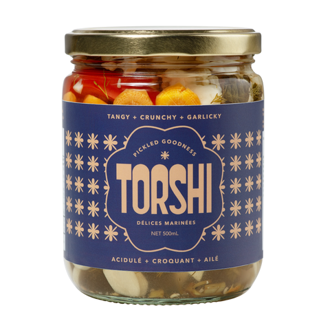 Jar of Torshi with a blue label on a white background